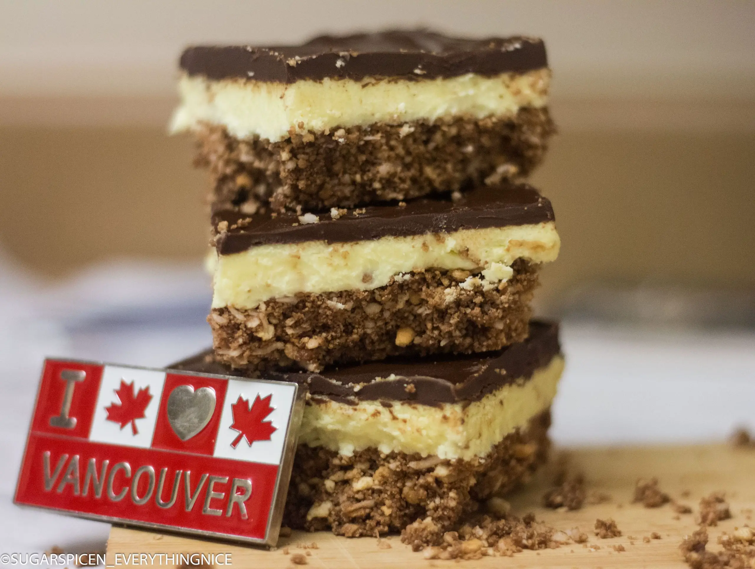 I love Vancouver magnet is leaning against stack of 3 Nanaimo bars