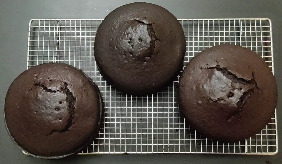 3 cakes cooled on wire rack