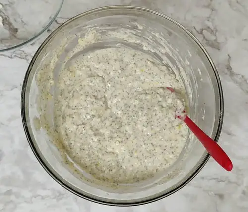 lemon poppy seed muffin - mixing dry and wet ingredients together