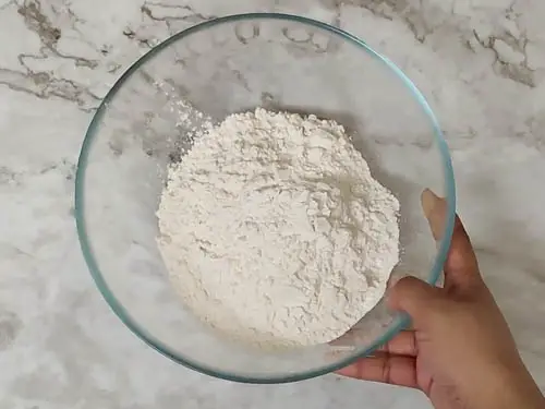 lemon poppy seed muffin - adding flour