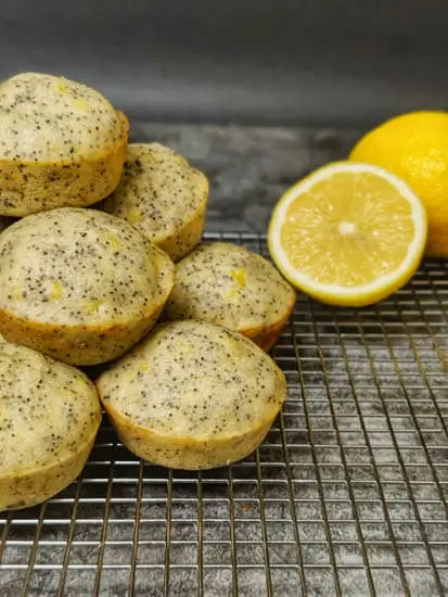 lemon poppy seed muffins on wire rack