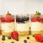 cheese cake in jars with topping sauce