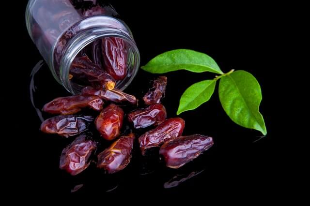 Dates falling out of a mason jar