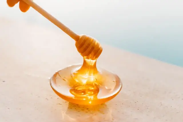Raw honey in a small bowl