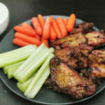 air fryer chicken wings served with ranch, celery and carrots