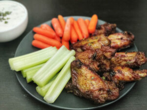 air fryer chicken wings served with ranch, celery and carrots