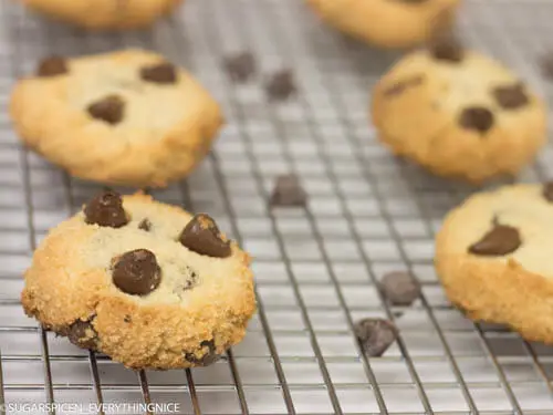 almond flour cookies with chocolate chips on a wire rack