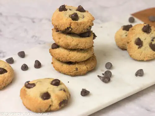 almond flour cookies kept on top of the the other with chocolate chips around