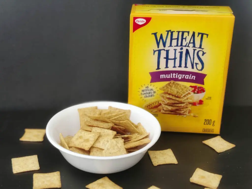 multigrain wheat thins in a bowl with wheat thins pack kept on the side