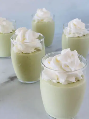 mousse cups with a dollop of cool whip on top 