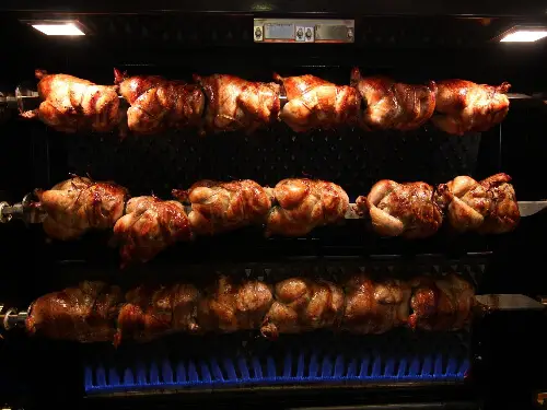 rotisserie chicken on rotisserie